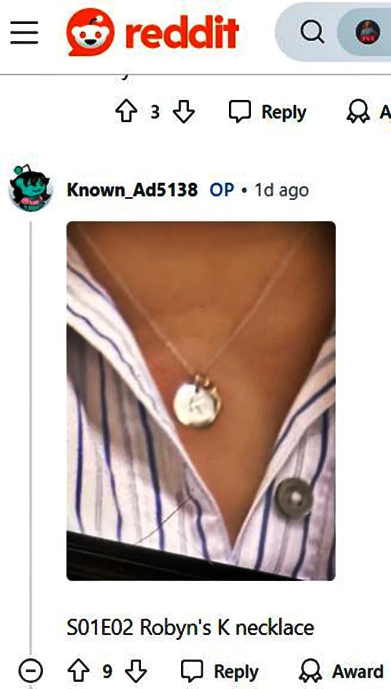 Robyn Brown's K on a necklace via Reddit