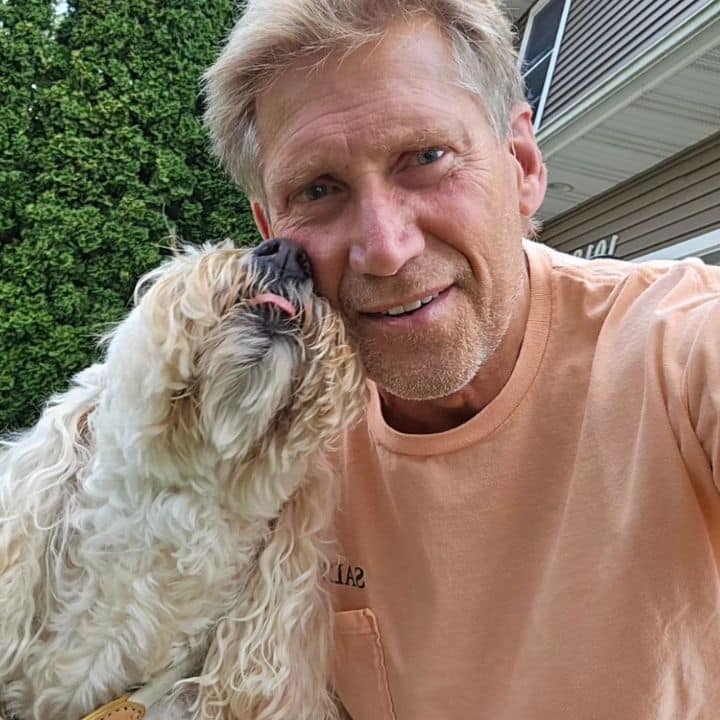 Gerry Turner alongside his dog Cody