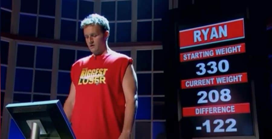 Ryan Benson standing on the scale in the season finale of The Biggest Loser