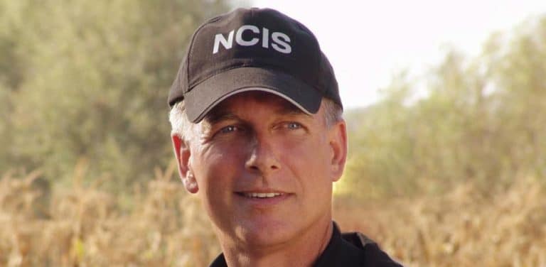 Mark Harmon wearing an NCIS baseball hat as Special Agent Gibbs.