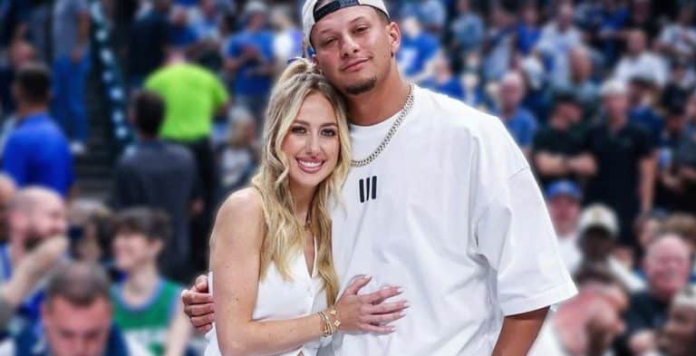 Patrick and Brittany Mahomes cuddle up at a basketball game