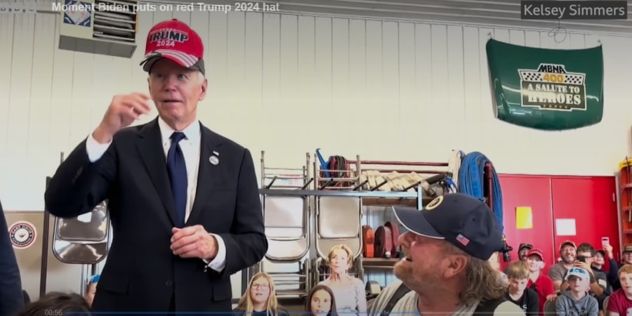 President Biden swaps a hat with a Trump supporter. - BBC - Kelsey Simmers