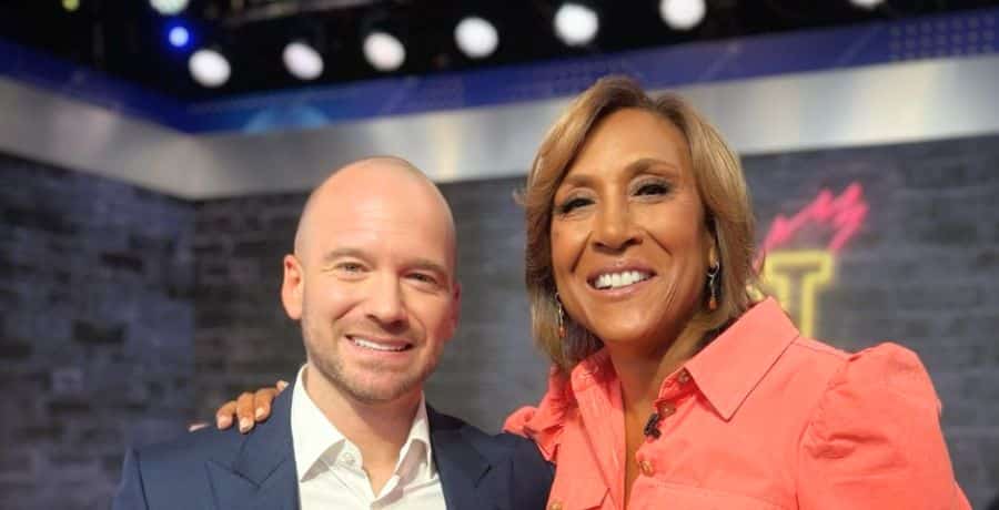 Robin Roberts and Sean Evans smiling for a photo