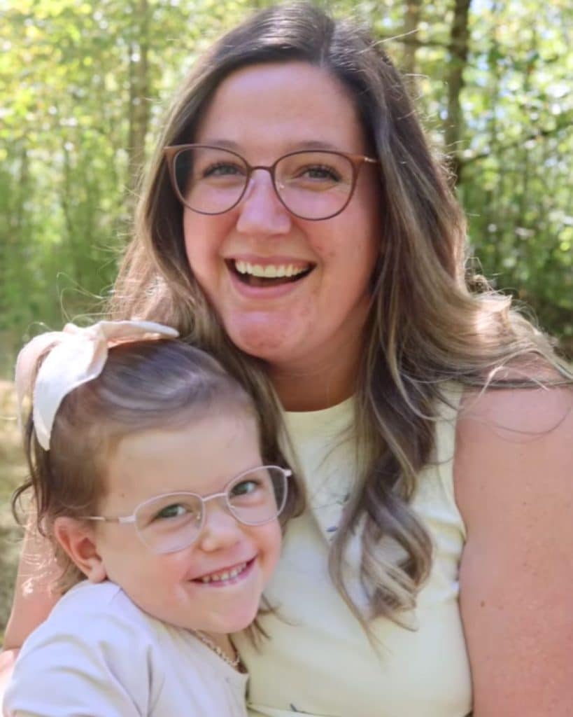 Tori Roloff hugging Lilah Roloff with new glasses