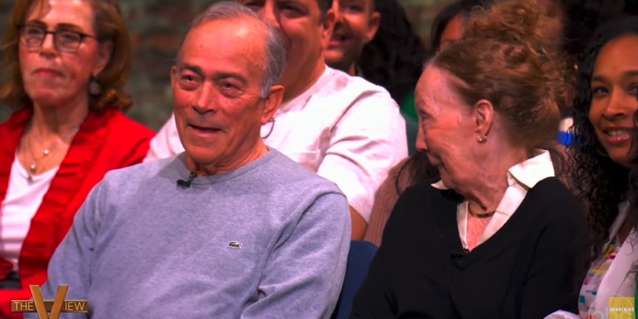 Sara Haines' parents react with surprise in the audience. - The View