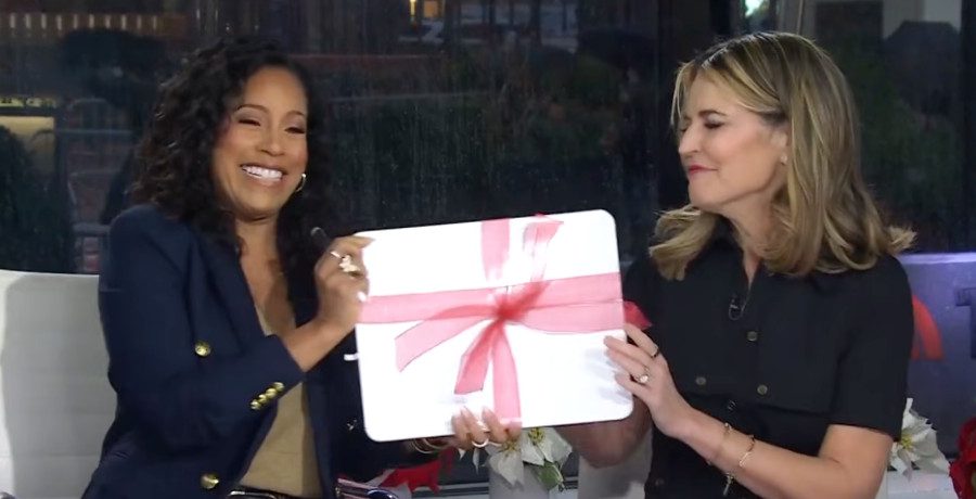 Sheinelle Jones gives Savannah Guthrie a whiteboard/Credit: YouTube